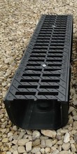 Водоотводный лоток пластиковый дренажный с решеткой чугунной (1000x246x185)